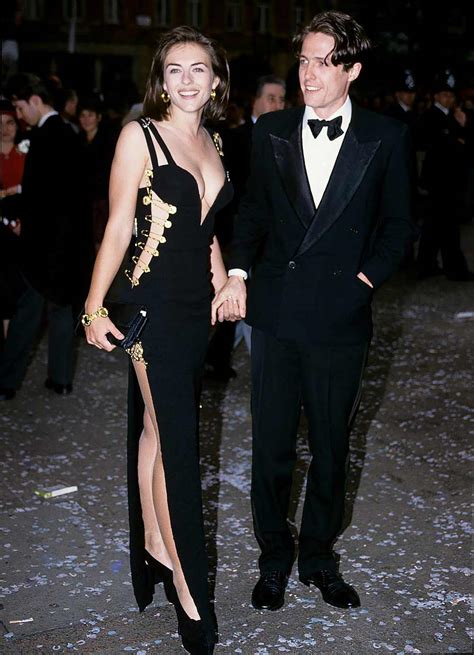 versace dress with pins|Versace elizabeth hurley dress.